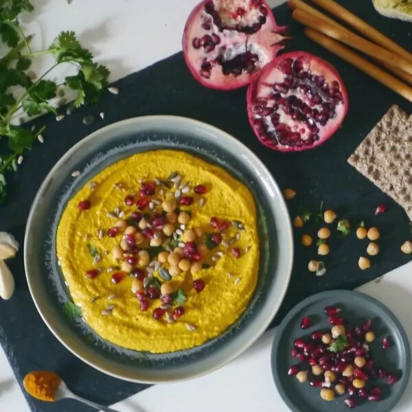 Turmeric hummus is a satisfying snack with added health benefits.