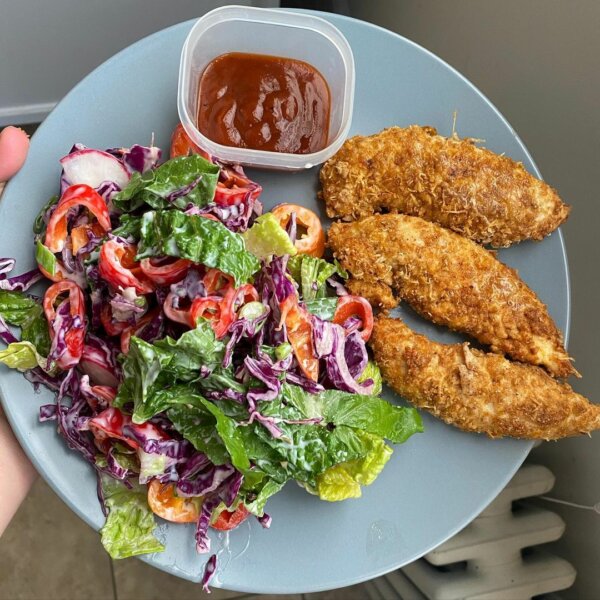 Chicken tenders breaded with low-calorie chips and served with a ranch salad