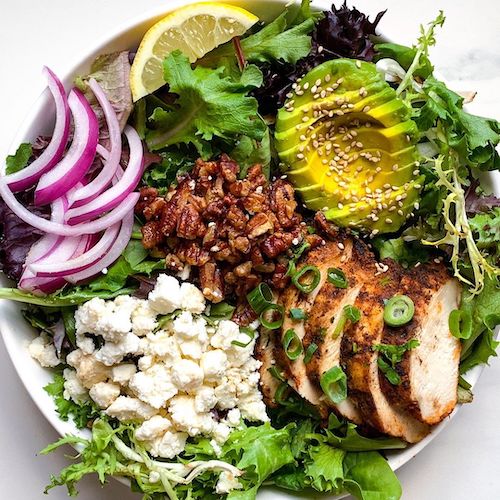 Miso paste and balsamic blend well together and add depth and variety to the classic balsamic vinaigrette in this chicken and pecan salad.