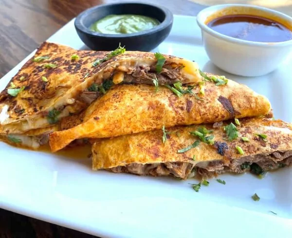 Birria Quesadillas made from Griffith Foods Birria de Jalisco Seasoning and obscure cuts of meat.