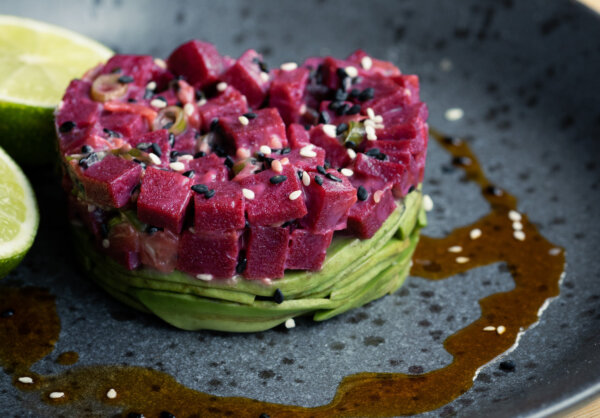 Plant-based tuna gets transformed into tartare served with avocado and chili oil.