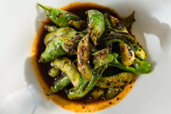 Edamame beans topped with togarashi seasoning.