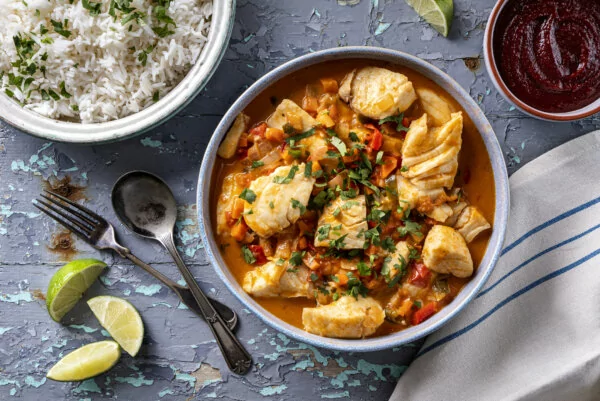 South American Flavors features delicious Brazilian fish stew moqueca with tomato, lime, red pepper, coconut milk and cilantro.