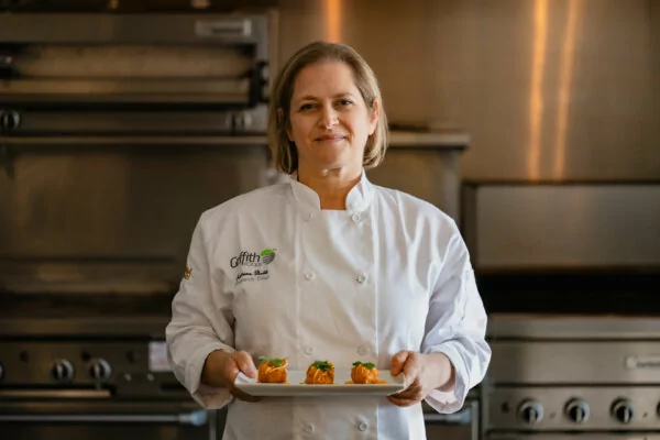 Chef Jordana Britt taps into the Canadian classic Bloody Caesar to sculpt an innovative seafood fritter, melding beverage-inspired flavors into every delightful bite.