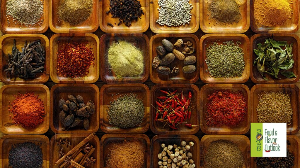 Variety of spices and seasonings arranged in wooden containers, representing maximalist flavor innovation.