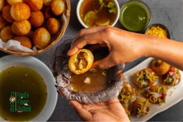 An assortment of pani poori representing the multi-sensory experience of maximalist flavor.