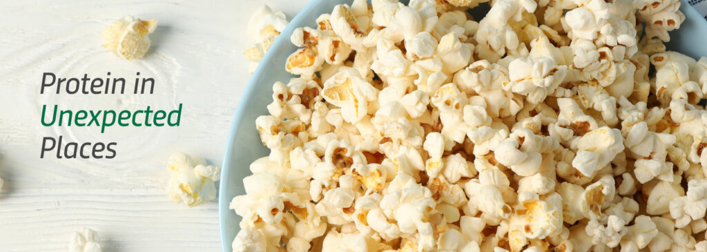 Popcorn towering high in a ceramic bowl.